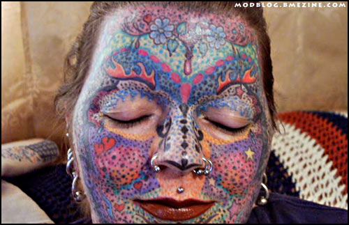 It's rare to see women with really heavy facial tattoo work hell 