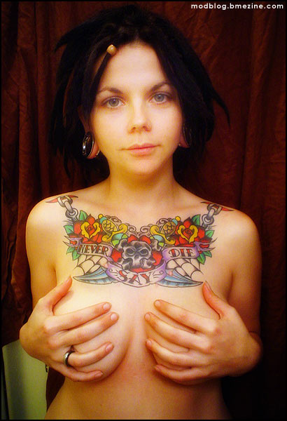 Her tattoo is by Chris Winn at Winn Body Art in La Jolla San Diego 