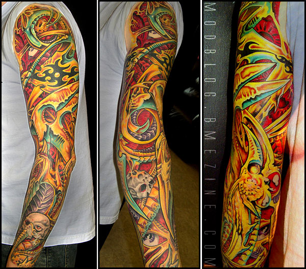  Gen X Tattoos in Willoughby Ohio with this bright biomechanical sleeve