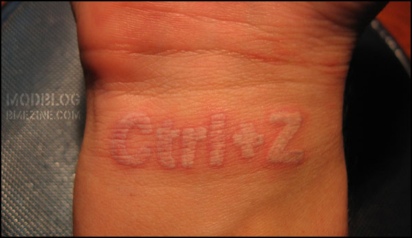 JuanKi got this Ctrl Z geek tattoo in white ink on his wrist by Fabian 