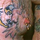 Tattoo Samy's piercings and tattoos