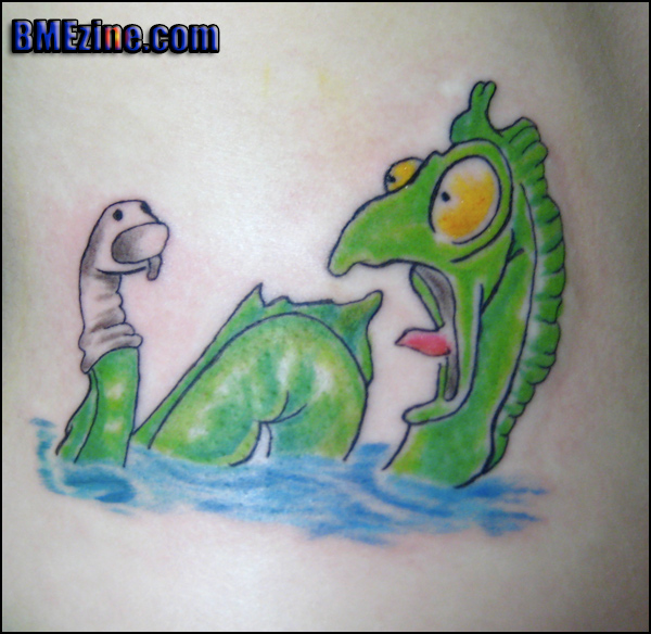 Scared sea monster tattoo
