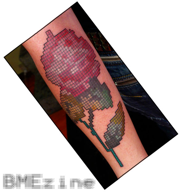 for a larger view of this pixellated crossstitch rose tattoo by Brianna