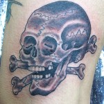 Skull tattoo by Rhys Gordon