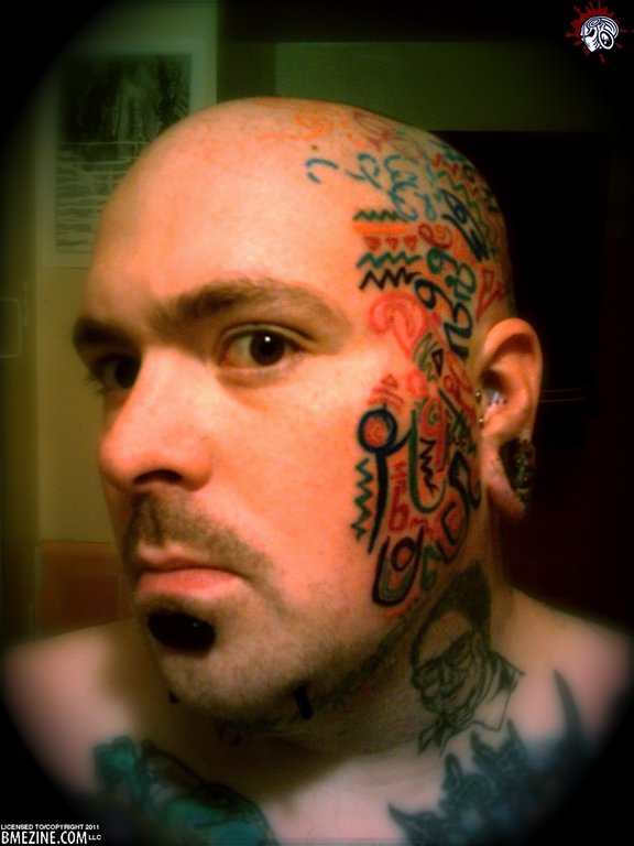 You can check out the full size image in the face and neck tattoo gallery 